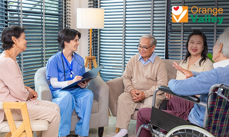 Nurse engaging with elderly residents in a nursing home