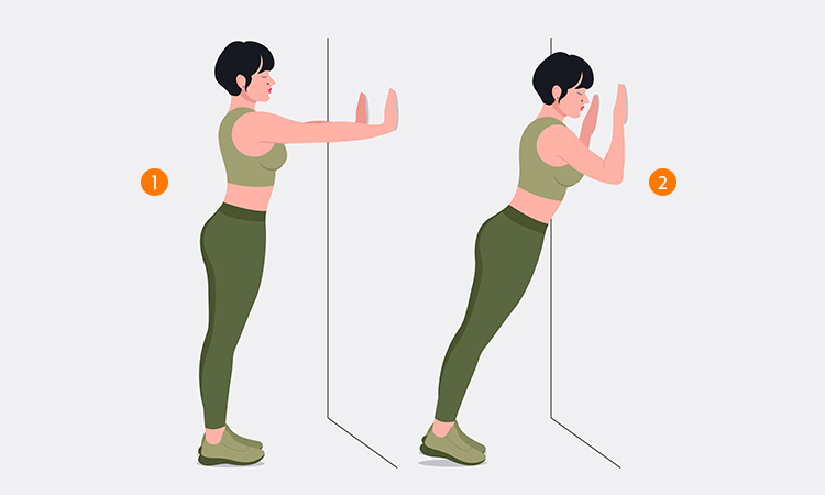 Woman performing standing wall push-up exercise